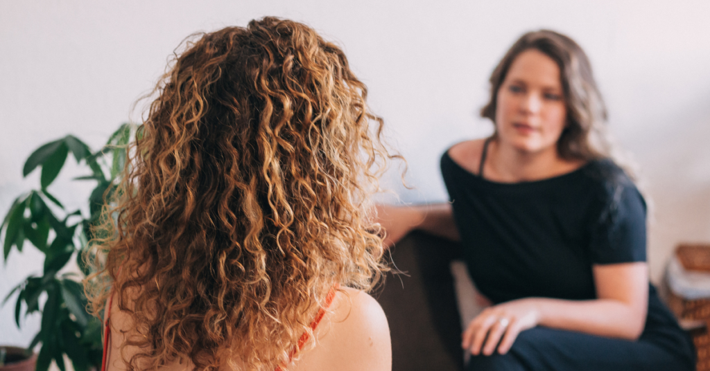 A woman talking to her healthcare provider about high blood pressure in pregnancy
