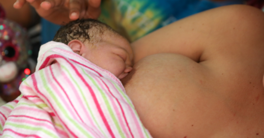 A baby with a good latch for breastfeeding