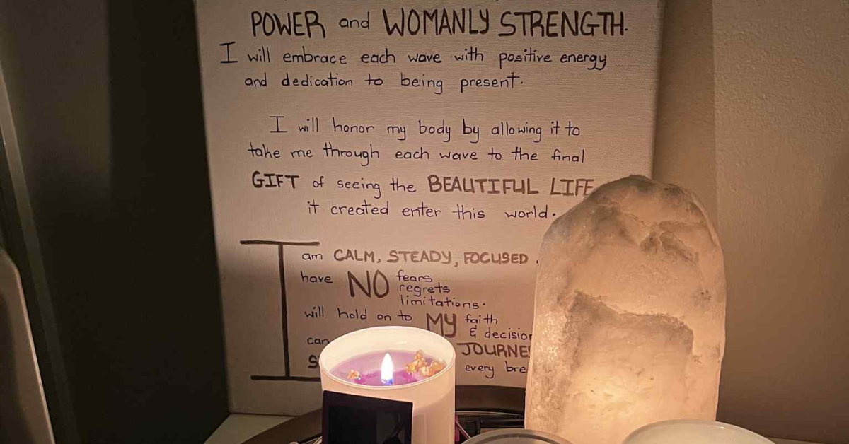 A woman's positive birth affirmations on a board at her home birth