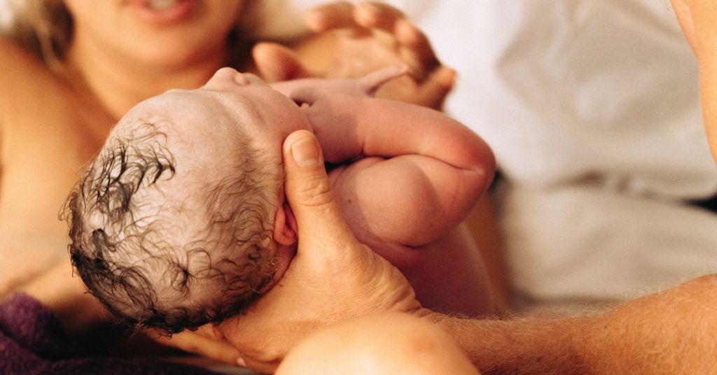 A baby just born via vaginal birth after cesarean at home